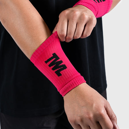 TWL - KNITTED WRISTBANDS - PINK/BLACK